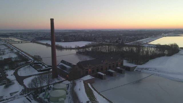 Colorful sky in morning at Woudagemaal in Friesland, water pumping station