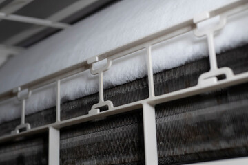 close up ice on coil cooler of dirty air conditioner.The problem of the air conditioner