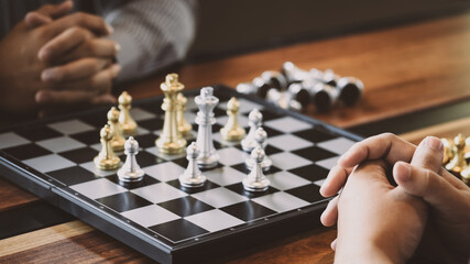 Businessman moving chess.ideas concept Plan leading strategy of successful competition.