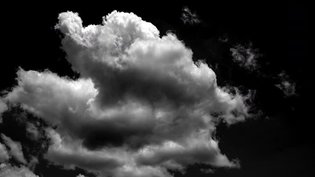 separate white clouds on a black background have real clouds. White cloud isolated on a black background realistic cloud.