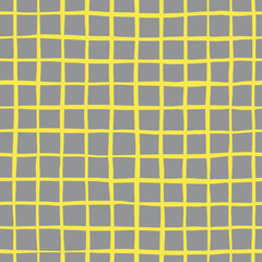Vector abstract seamless pattern with yellow crossed lines on grey background. Checkered backdrop in simple rough style. Illustration in colors of the year. Perfect for fabrics and wrapping paper. Sum
