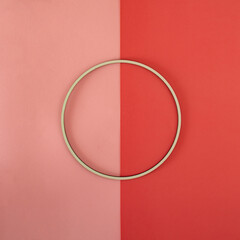 white circle frame on the bright and bold pink background. minimal flat lay. creative modern summer decoration idea