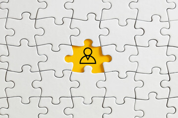 Employee or user icon on missing puzzle piece.