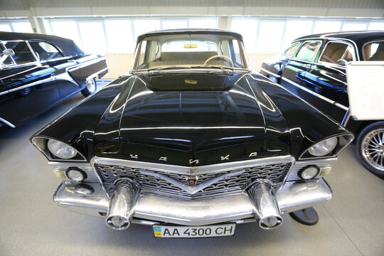 Kyiv, Ukraine - May 22, 2021: Wide angle of an old soviet car Chaika