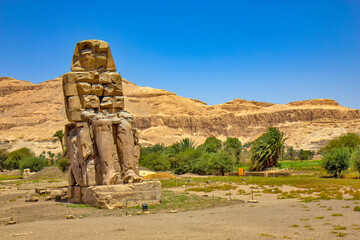 The Colossi of Memnon statues of the Pharaoh Amenhotep III in Egypt