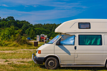 Camper van camping on nature