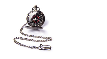 Antique watch, beautiful antique pocket watch on white surface, selective focus.