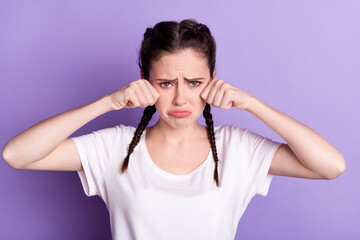 Photo of young girl unhappy sad upset cry stressed depressed problem fail isolated over purple color background