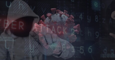 Composition of hooded hacker with covid cells and cyber attack security warning on screen