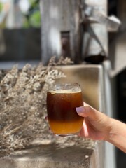 Ice Fresh orange americano in sun light 
