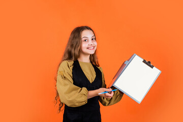 stylish child girl working with paper documents in folder, education