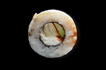 one sushi roll close up on black background