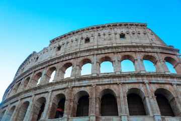 Fototapeta na wymiar Flavian Amphitheatre in Rome . Famous building from Roman Empire . Colosseum on the Palatine Hill