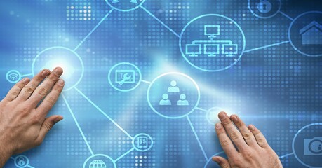 Composition of man touching screen with network of digital icons over blue background