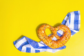 Oktoberfest concept - pretzel on a traditional napkin