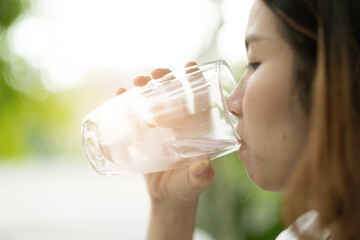 woman drinking fresh water, healthcare concept