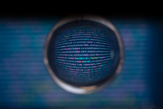 Software developer code. Abstract computer script code. Code in a glass ball.