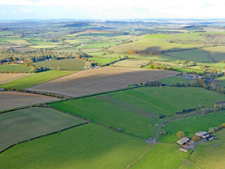 Paragliding above the fields at Monks Down in Wiltshire	