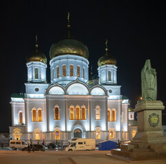 Fototapeta premium Rostov Cathedral of the Nativity of the Blessed Virgin. Citizens walk near the cathedral