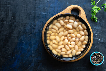 white beans boiled legumes ready to eat bean diet on the table healthy food meal snack copy space...
