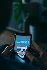 man using a password manager app in his smartphone