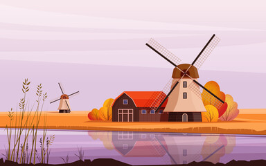Rural landscape with traditional  windmill and barn on the river bank