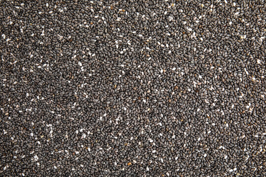 Heap of chia seeds as background, top view. Veggie food