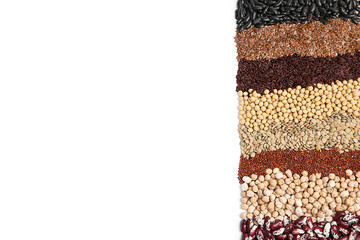 Various raw veggie seeds on white background, top view