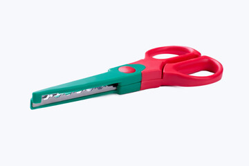 Colorful plastic scissors. Stationery tool.