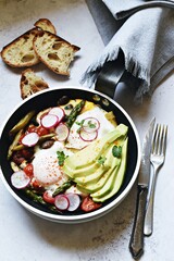 Asparagus, tomato and mushroom shakshuka with avocado and radish