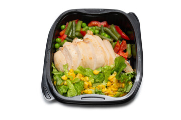 Ready food in a container. Stewed chicken, stewed vegetables.