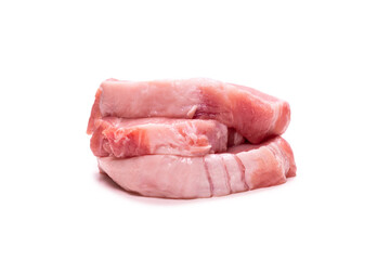 Raw pork pieces isolated on a white background.