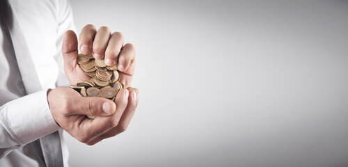 Man showing coins. Business. Finance