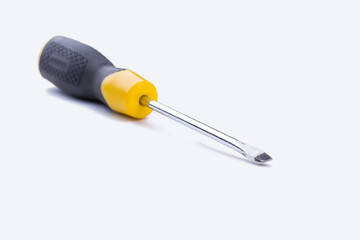 Screwdriver with rubber handle on white background.