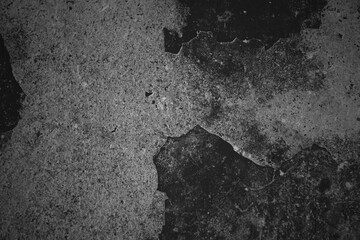 Texture of a grungy black concrete wall as background. Dark gray concrete wall, 