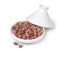 White small tajine with dried rose buds close up isolated on white background  