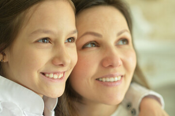 Portrait of a beautiful woman and girl