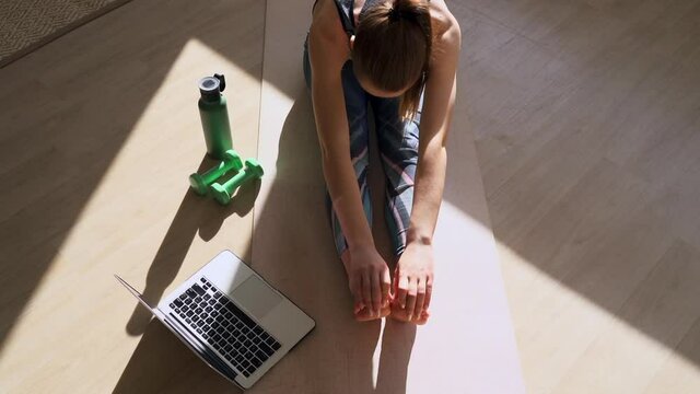 Woman practice stretch sport at home Spbas. Female flex body, do hamstring exercise. Fit slim