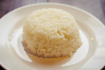 cooked stream Rice in white plate