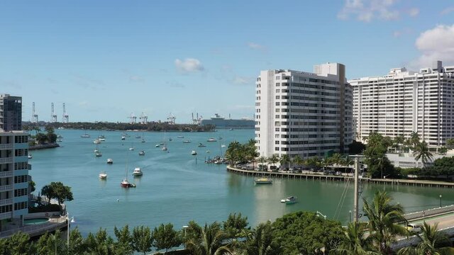 Aerial of bridge to Venetian Islands in Miami Beach with sailboats in marina harbor Miami 