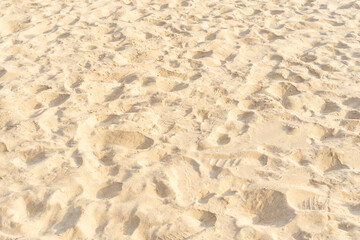 Sand pattern texture in tropical beach as background.