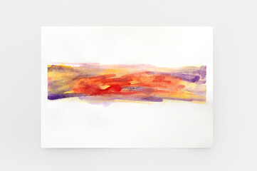 Abstract watercolor hand painted background. Colorful multicolored watercolor brush on white paper. Close-up.