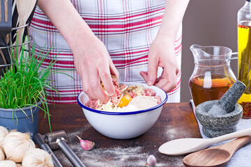 Making homemade meatballs in the kitchen
