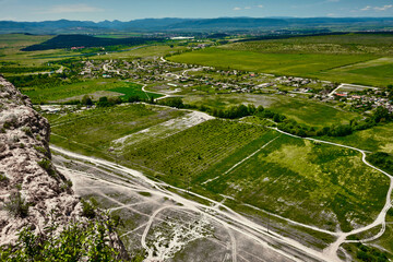Fototapeta na wymiar Landscape green fields and view from the mountain