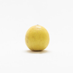 ripe yellow lemon in a white background