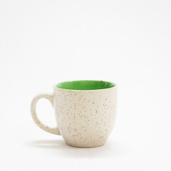 off-white coffee cup in a white background