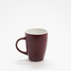 brown coffee cup in a white background