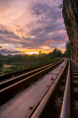 Fototapeta na wymiar Thai Train on River Kwai Bridge of Kanchanaburi, Thailand
