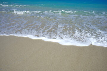 Fototapeta na wymiar Beautiful summer scenery. calm waves on the blue water. Furuzamami Beach in Zamami island, Okinawa, Japan - 日本 沖縄 座間味島 古座間味ビーチ 青い海 