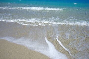 Beautiful summer scenery. calm waves on the blue water. Furuzamami Beach in Zamami island, Okinawa, Japan - 日本 沖縄 座間味島 古座間味ビーチ 青い海	